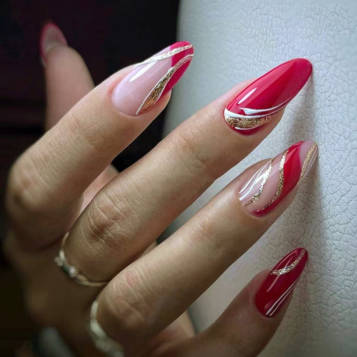 Elegant artificial nails with artistic lines and glitter accents Bowlift