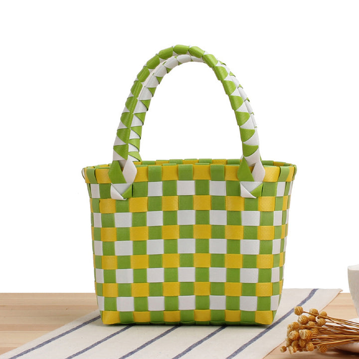 Handbag made of woven material with a stylish check pattern Bowlift