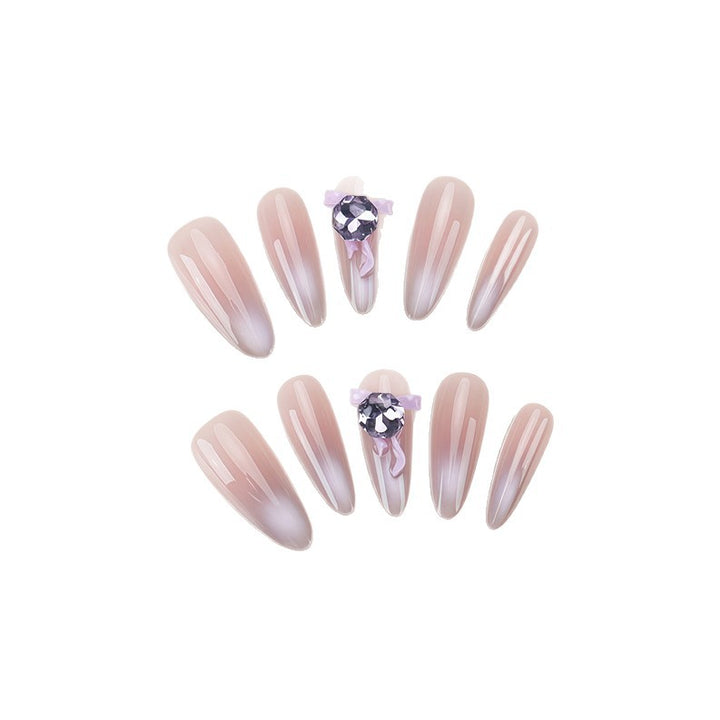 Artistic Ombre Press-On Nail Design with Crystal Accent Bowlift