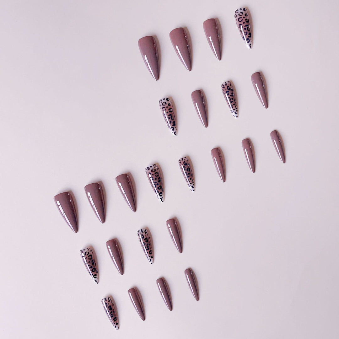Nail set with elegant leopard pattern and modern stiletto design Bowlift