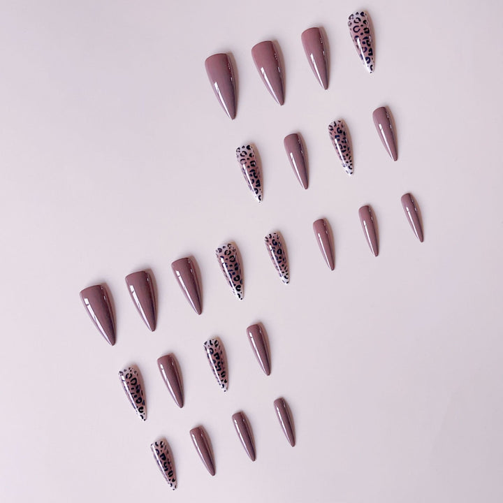 Nail set with elegant leopard pattern and modern stiletto design Bowlift