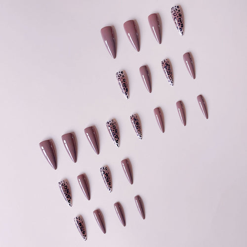 Nail set with elegant leopard pattern and modern stiletto design Bowlift