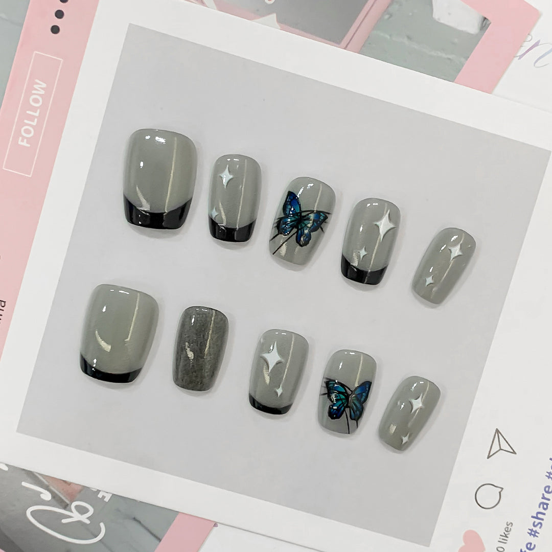 Artistic nail tips with butterfly designs Bowlift
