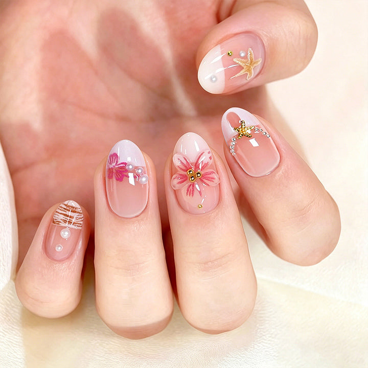 Elegant artificial nails with floral designs and glitter accents Bowlift