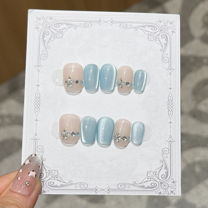 Elegant Artificial Nails with Radiant Accents Bowlift