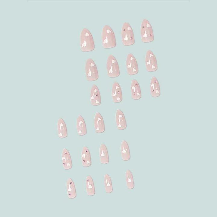 Decorative artificial nails with heart motif and rhinestones Bowlift