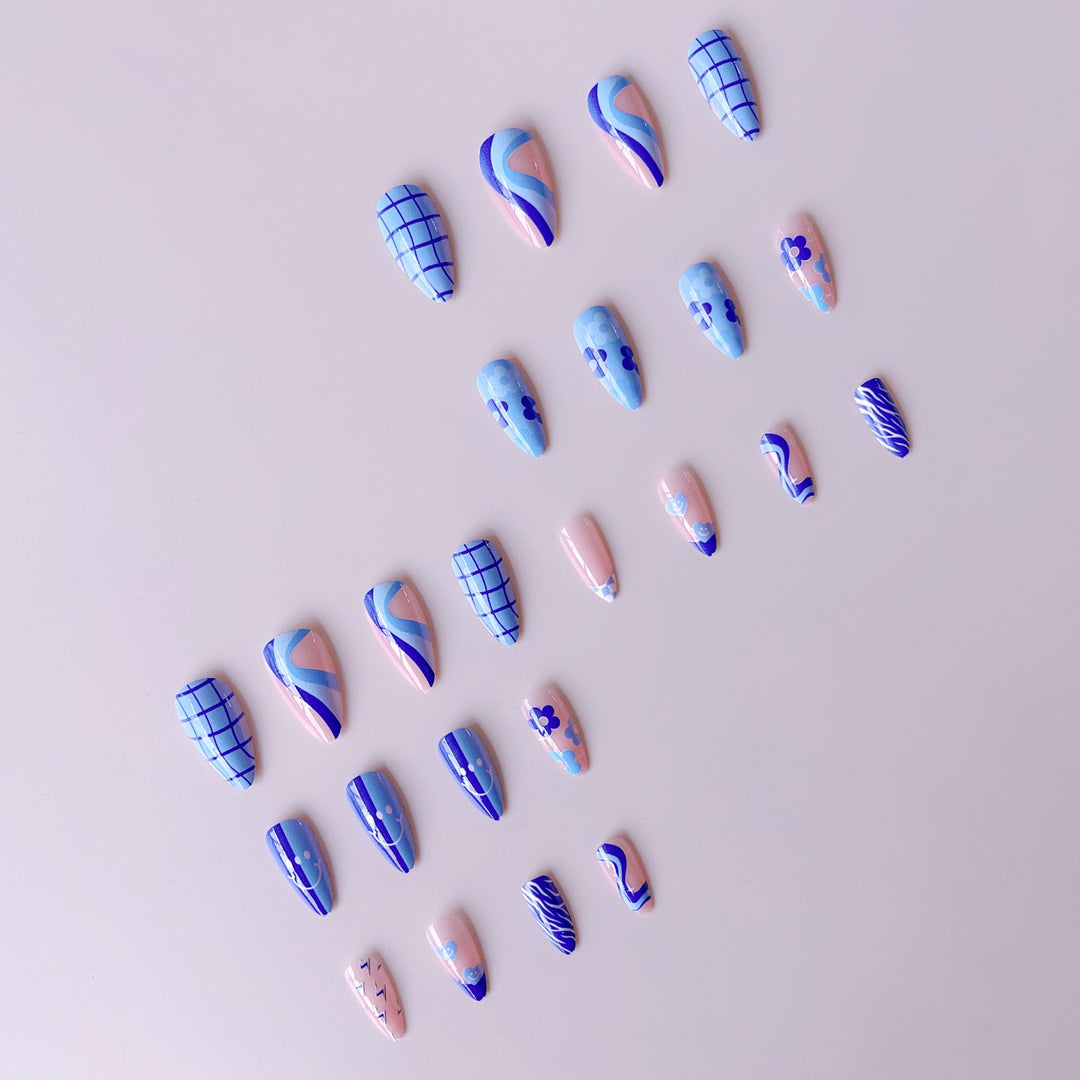 Artificial nail set with colorful flower pattern and creative accents Bowlift