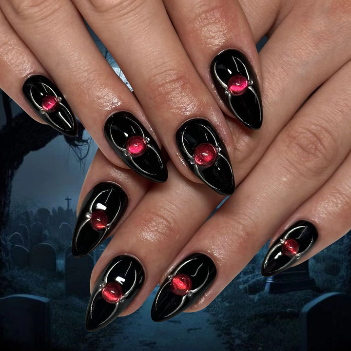 Creative Stiletto Nail Art with Blood Red Accents Bowlift