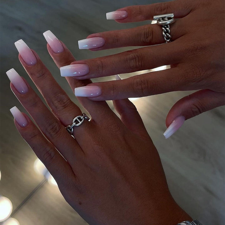 Artificial nail set with sparkling glitter effects and delicate winter motif Bowlift