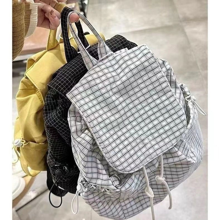 Fashionable Backpack with Practical Drawstring Bowlift