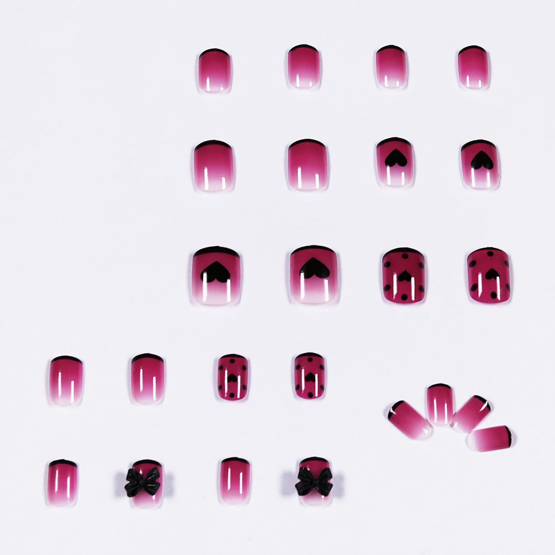 Artistic nail extensions with cute bow and heart designs Bowlift