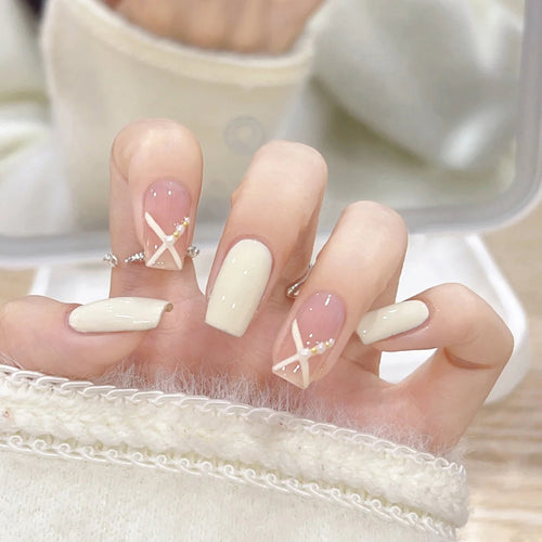 Acrylic nail set with elegant and playful design Bowlift