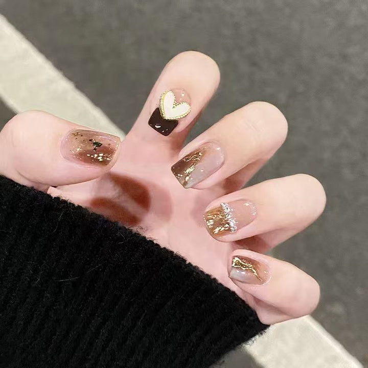 Artistic Heart-Themed Nail Extensions Bowlift