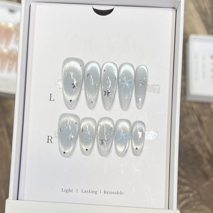 Decorative Stiletto Press-On Nail Set with Star and Bow Accents Bowlift