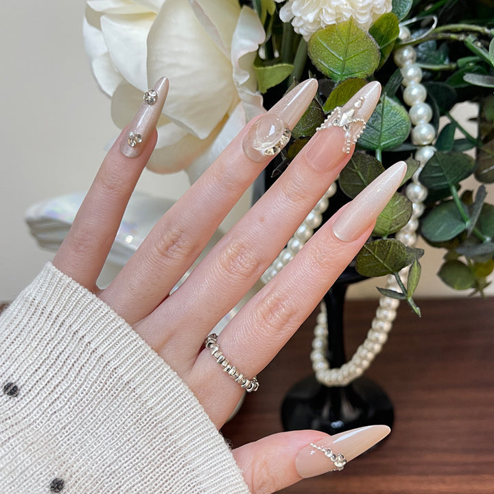 Elegant Stiletto Press-On Nail Art with Rhinestone and Pearl Accents Bowlift