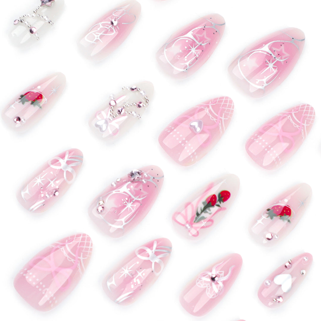 Artificial nail art with romantic design and glitter accents Bowlift