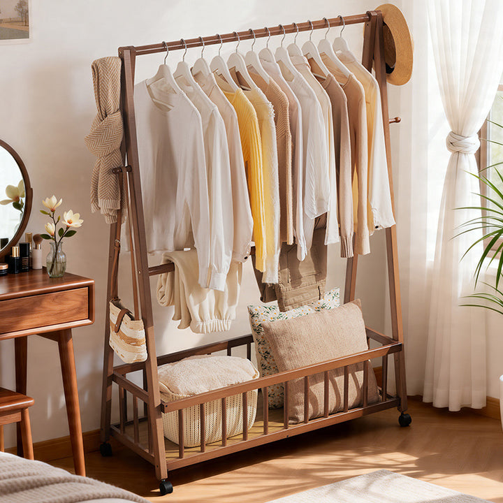 Designer laundry rack with foldable frame and practical shelf Bowlift