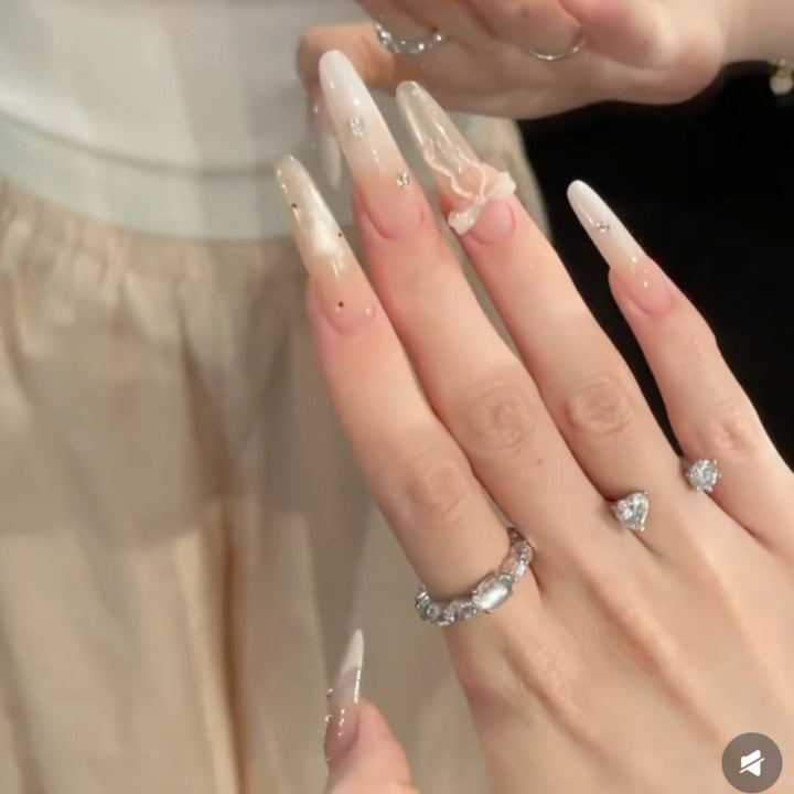 Long Stiletto Press-On Nails with Decorative Accents Bowlift