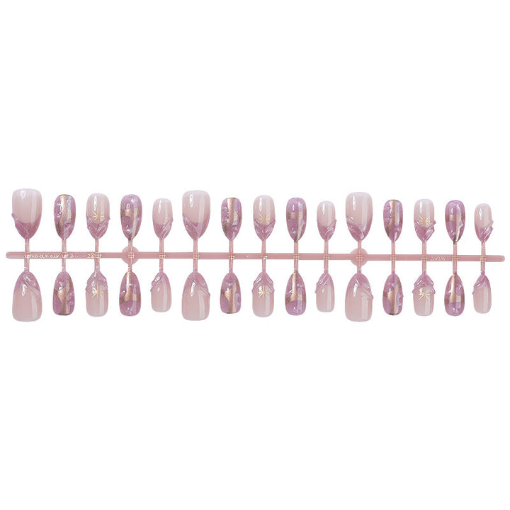 Artificial nail set with glamorous tip accents Bowlift