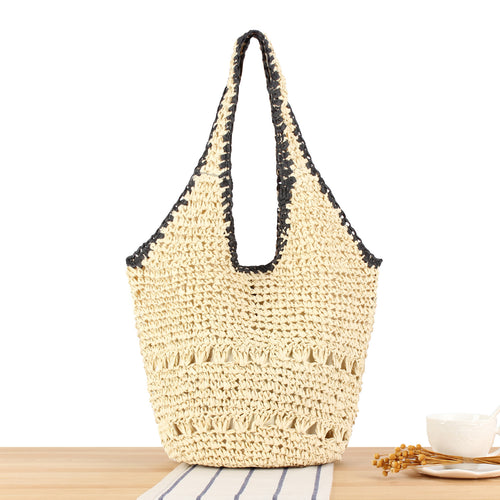 Beach shoulder bag made of handwoven natural material with comfortable carrying handles Bowlift