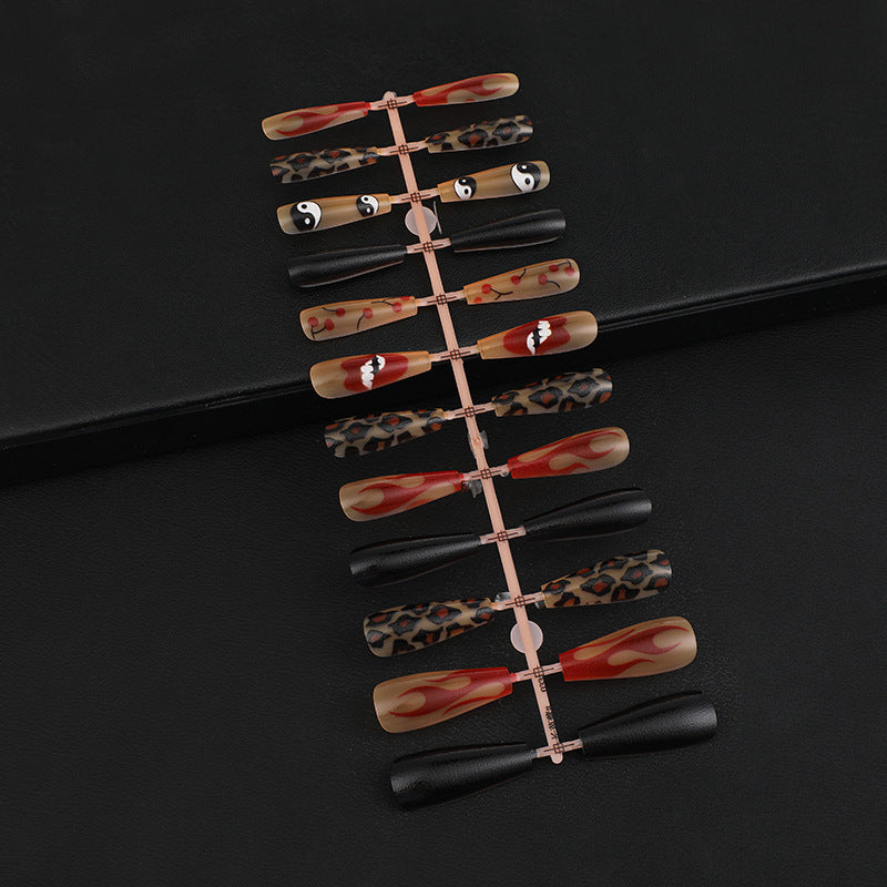 Artificial nails in creative designs with animal and face motifs Bowlift
