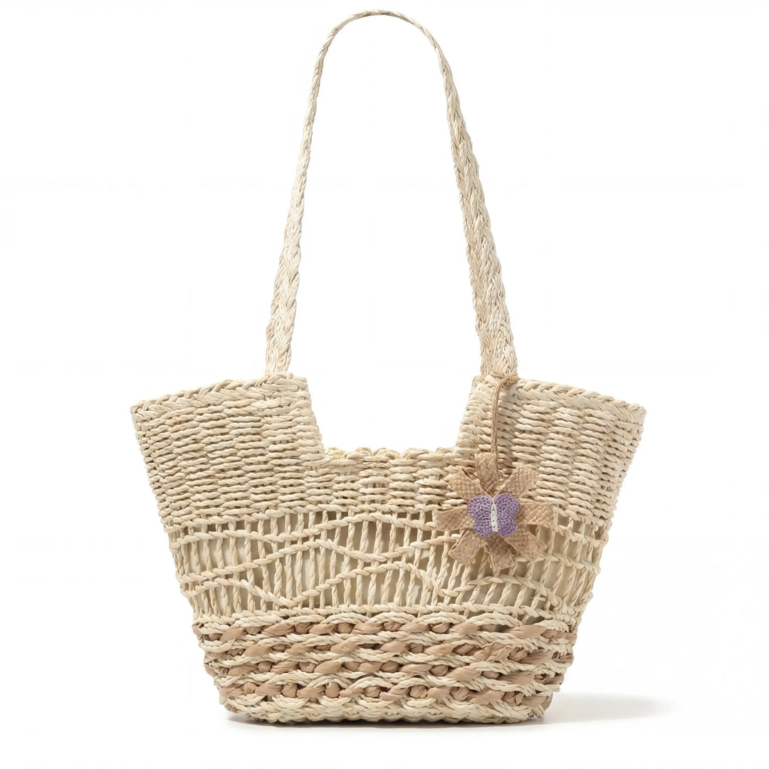Handwoven straw bag with unique flower detail Bowlift