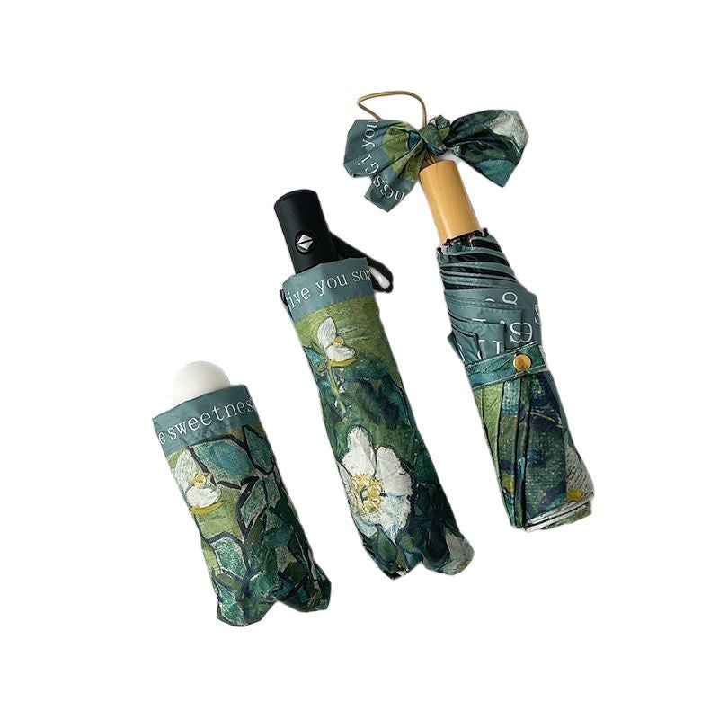 Women's Folding Umbrella with Floral Accents Bowlift