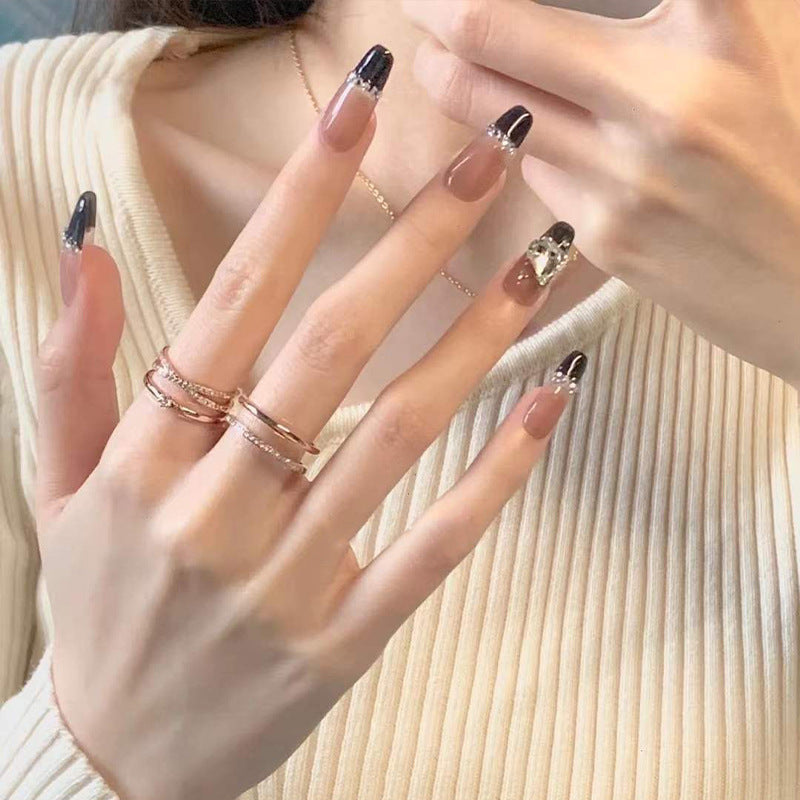 Artificial nails with heart accent and glamorous decorations Bowlift