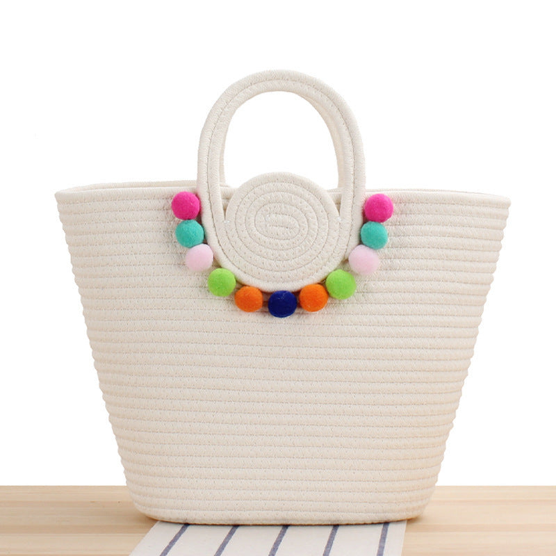 Fashionable handbag with playful pompom decoration Bowlift
