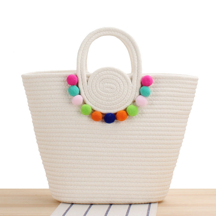 Fashionable handbag with playful pompom decoration Bowlift