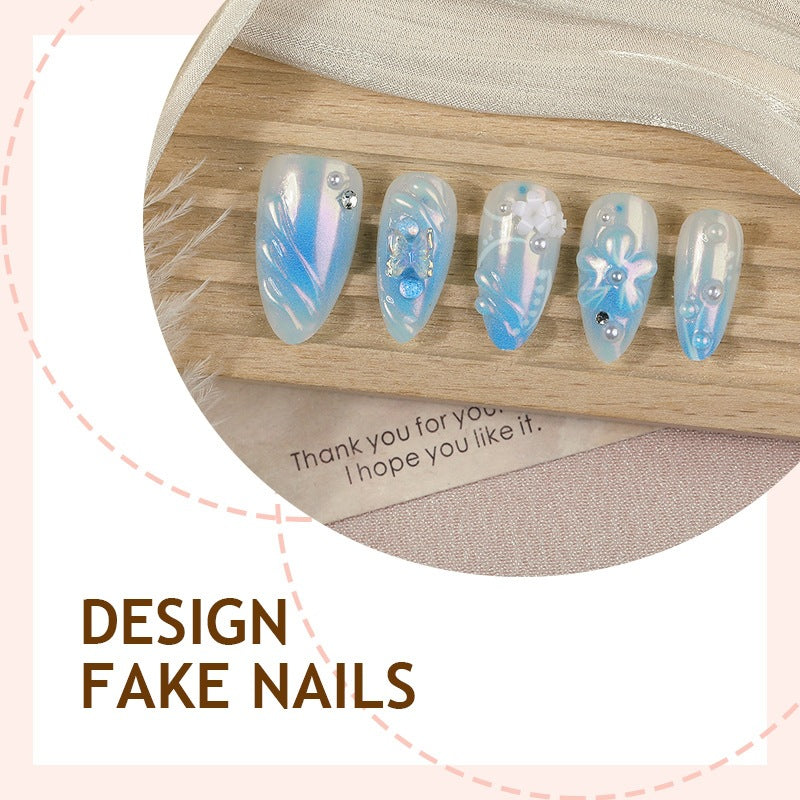 Creative nail set with floral accents and glittering details Bowlift