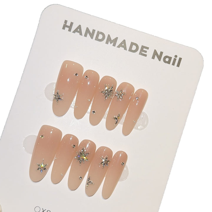 Artificial nails with shimmering effect and elegant star motif Bowlift