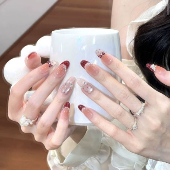 Artistic Long Stiletto Press-On Nail Set with Bow and Gemstone Accents Bowlift