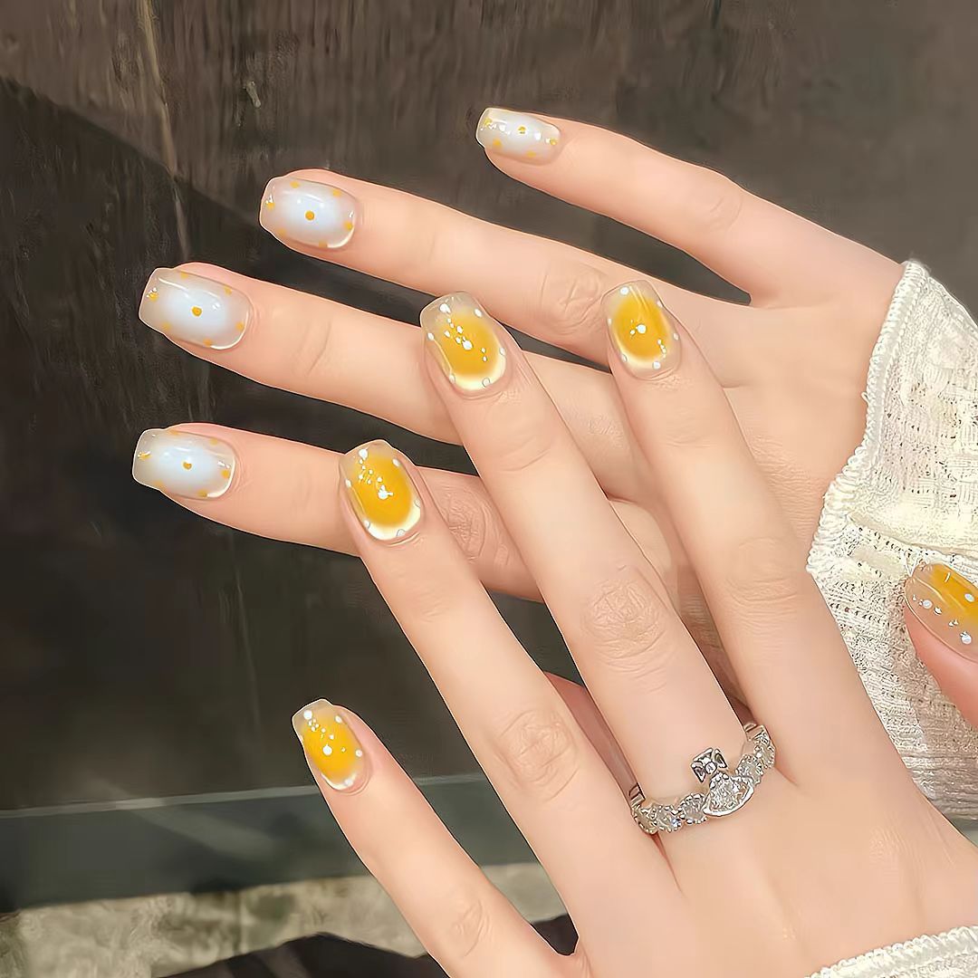 Artistic Press-On Nail Set with Whimsical Dot Designs Bowlift
