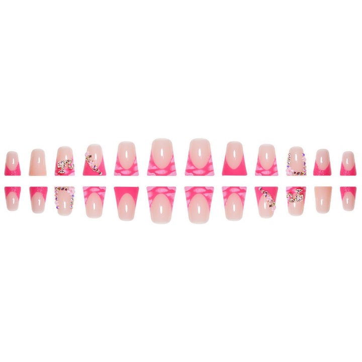 Artistic Press-On Nail Extensions with Rhinestone Accents Bowlift