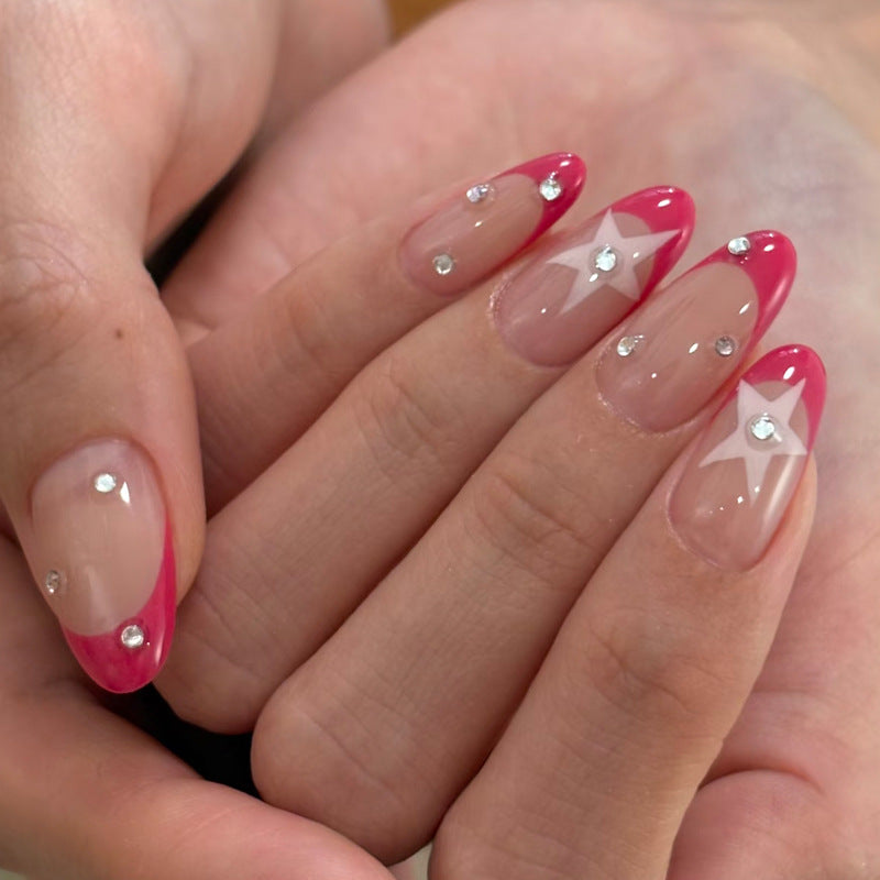 Elegant Press-On Nail Design with Star and Rhinestone Accents Bowlift