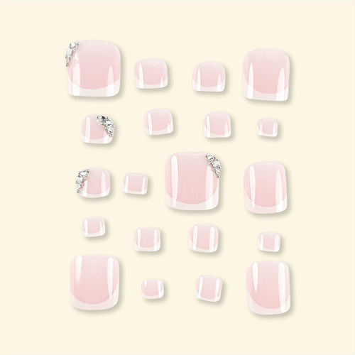 Artificial nail set with elegant French manicure and glitter accents Bowlift