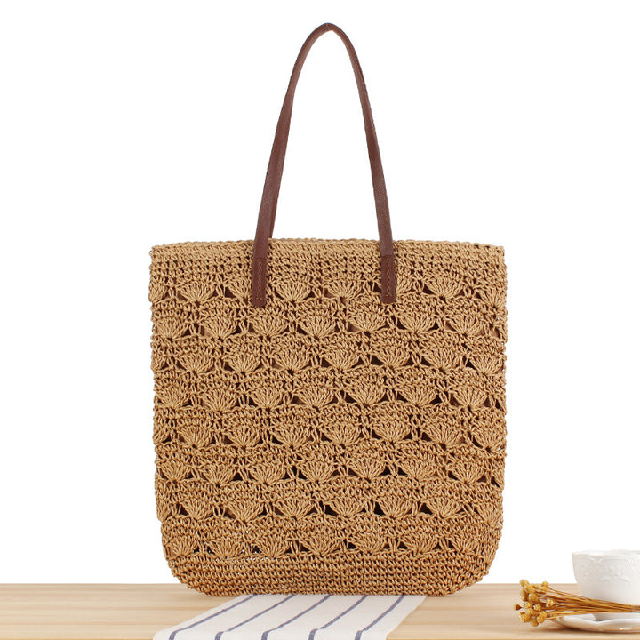 Stylish handbag made of woven natural material Bowlift
