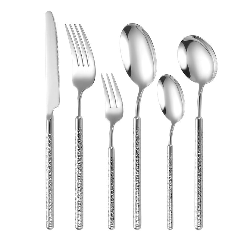Elegant dessert spoon with elaborate handle design Bowlift