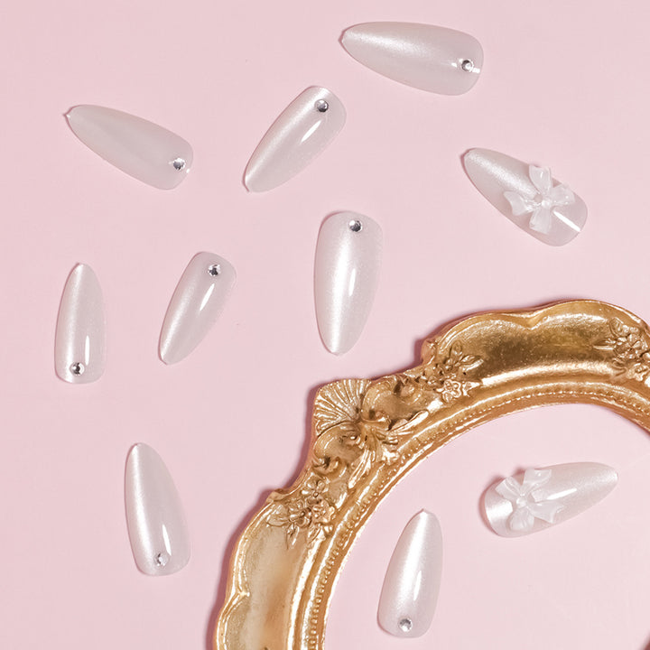 Elegant Stiletto-Shaped Press-On Nails with Decorative Bow Accents Bowlift