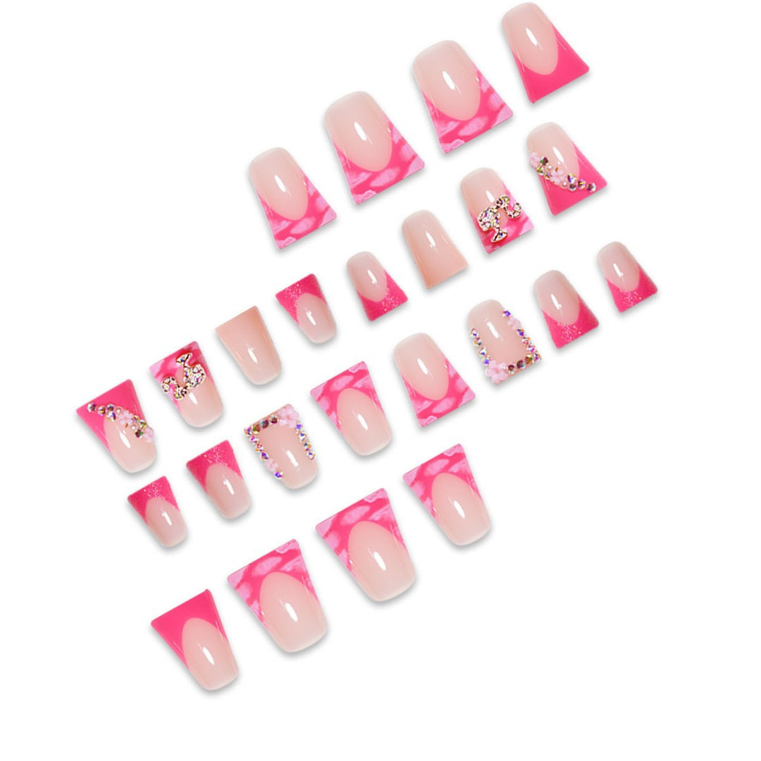 Artistic Press-On Nail Extensions with Rhinestone Accents Bowlift