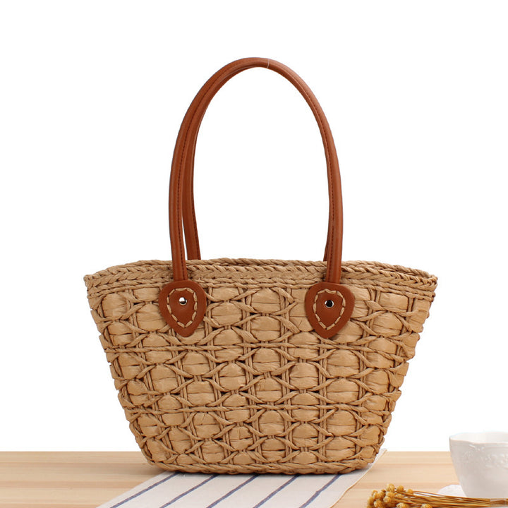 Handcrafted wicker bag with elegant leather accents Bowlift