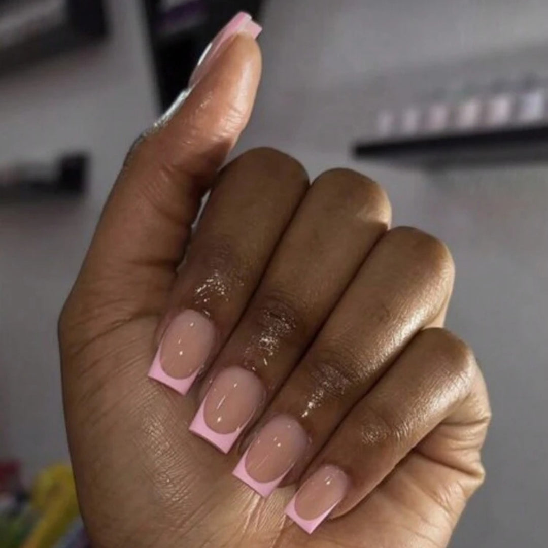 Artificial nail set with modern French tips and elegant shine Bowlift