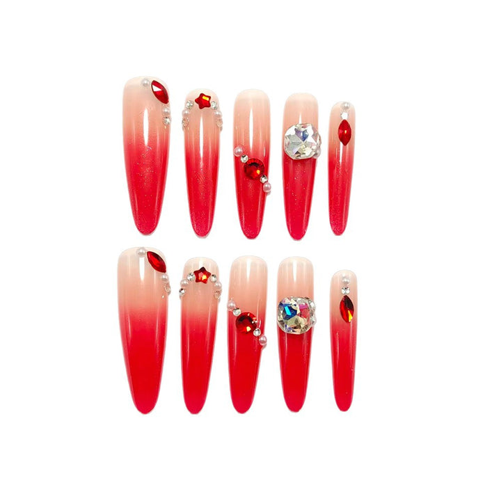 Artificial nails in elegant ombre style with glitter and jewelry accents Bowlift