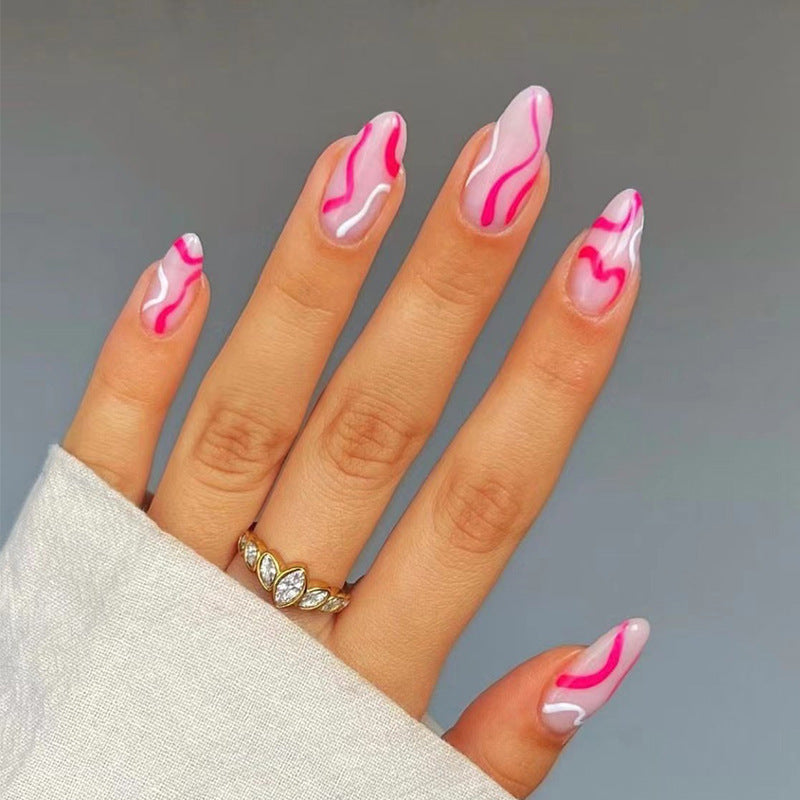 Artful nail extensions with an elegant leaf pattern Bowlift