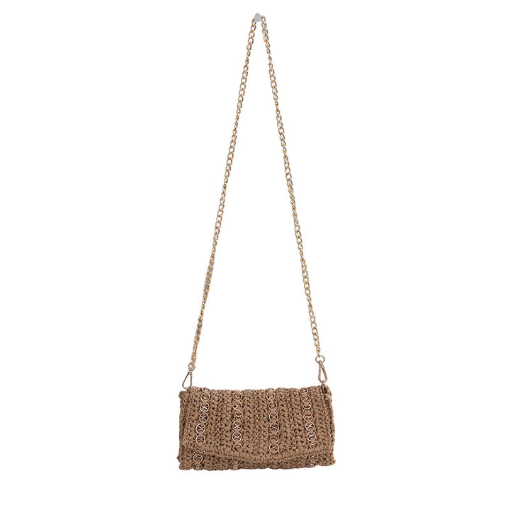 Clutch with chain shoulder strap and handcrafted macrame closure Bowlift