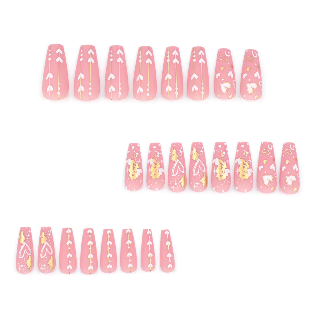 Artificial nail art with heart and glitter designs Bowlift