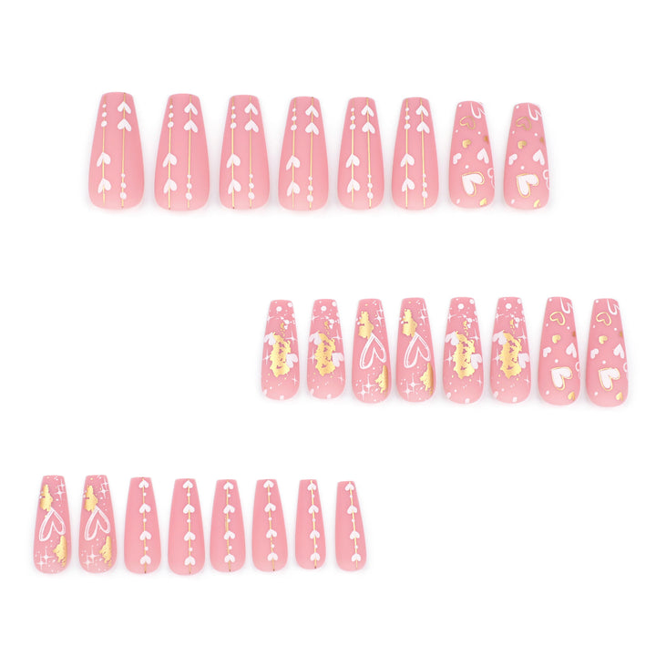 Artificial nail art with heart and glitter designs Bowlift