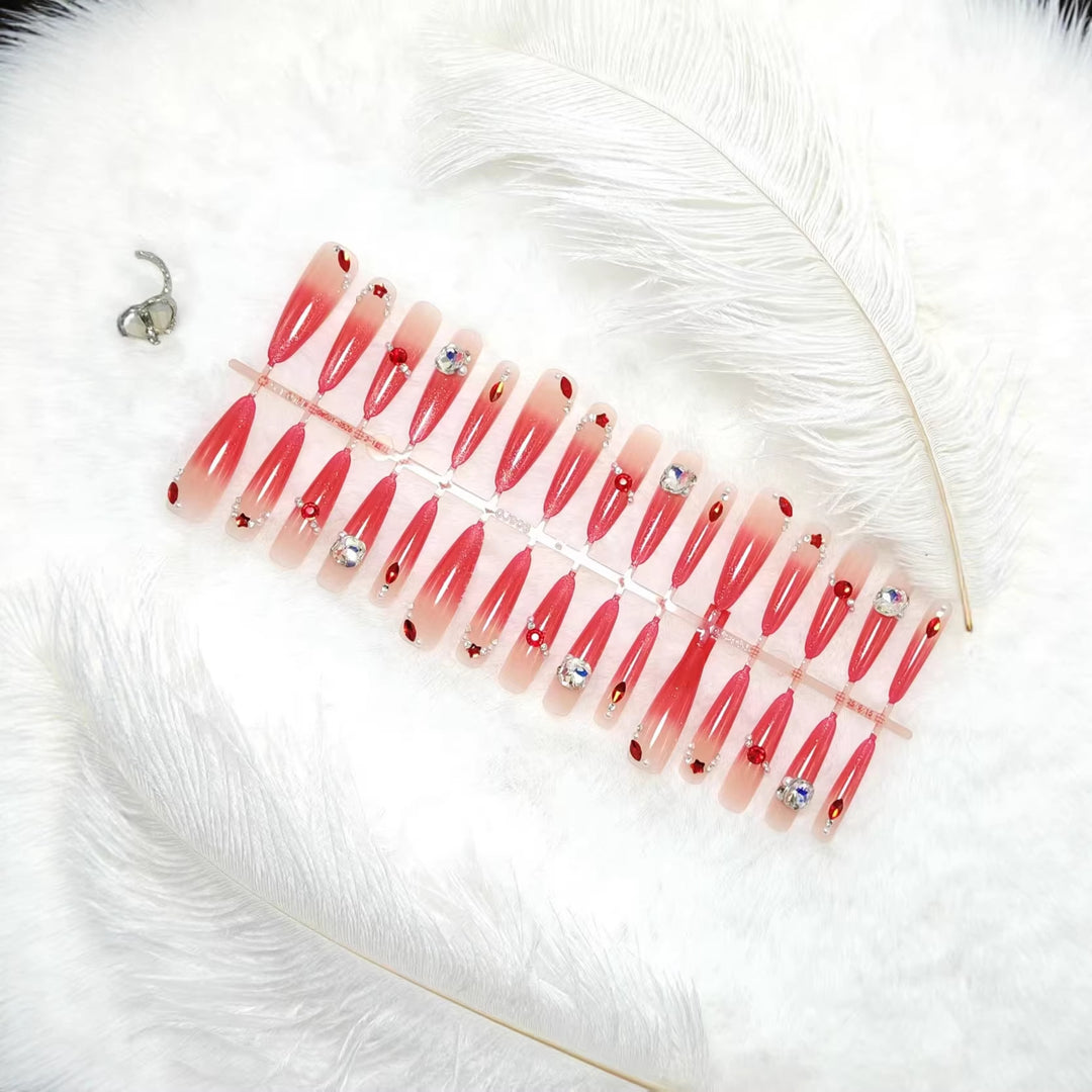 Glamorous artificial nails with sparkling ombre effect and elegant embellishments Bowlift