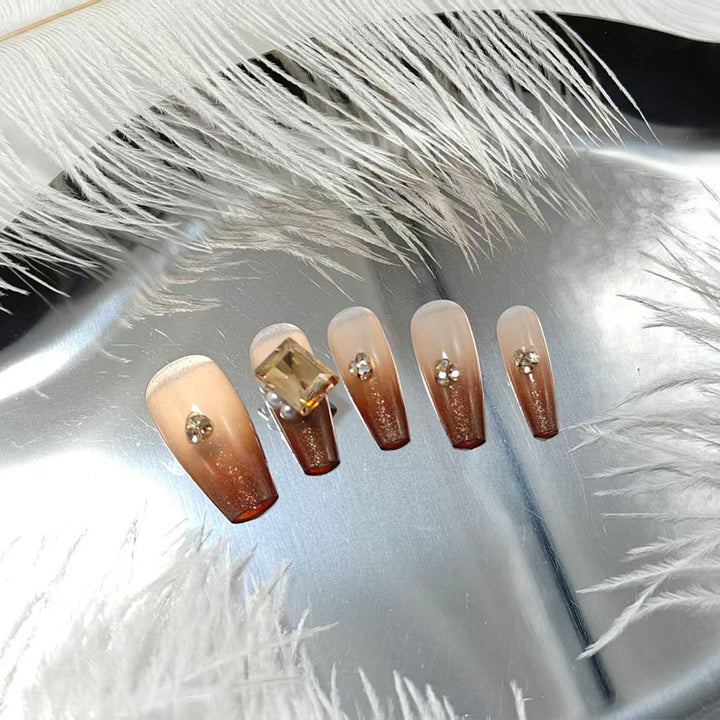 Artificial nails with elegant ombre effect and exquisite gemstones Bowlift